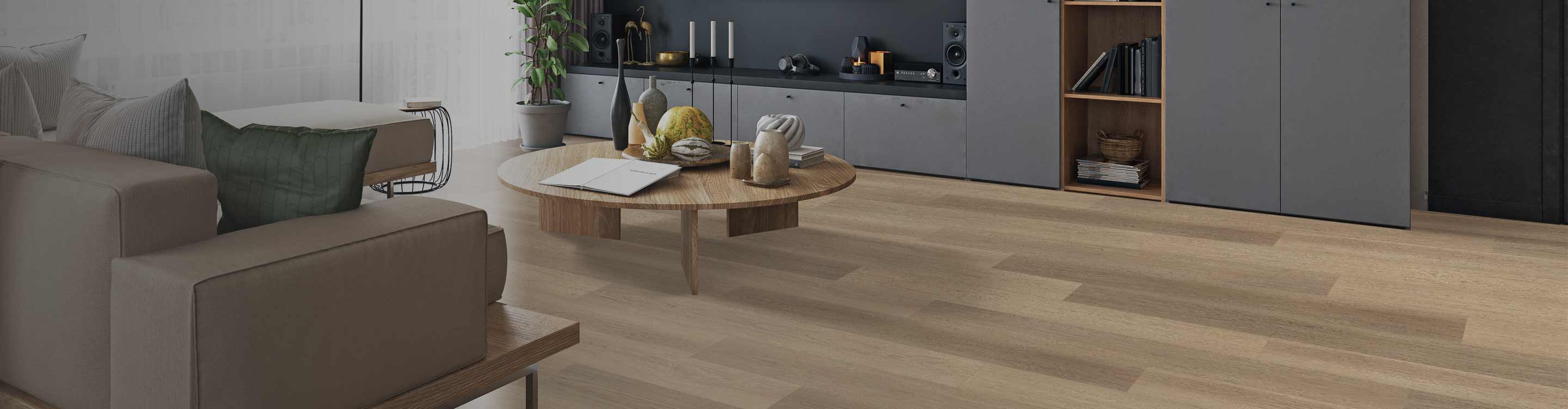 Wood-look laminate flooring installation in family room.